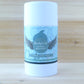 Lavender scented 2.6 ounce, 75 gram deodorant stick in blue label with cap on and cedar background